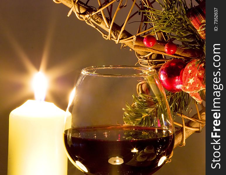Christmas decoration with gift, wine and candles