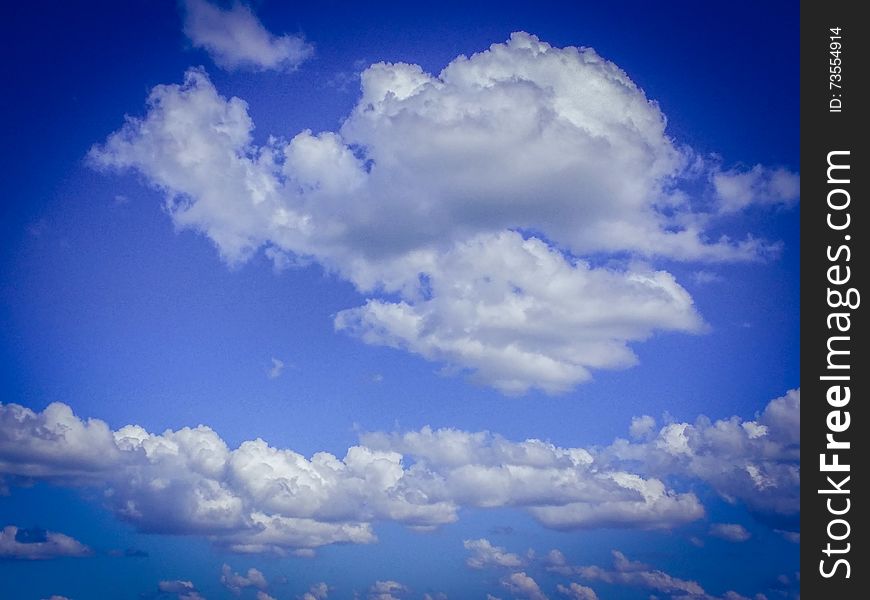 Conceptual picture with sky vision in your dream with fluffy white clouds in a hot summer day