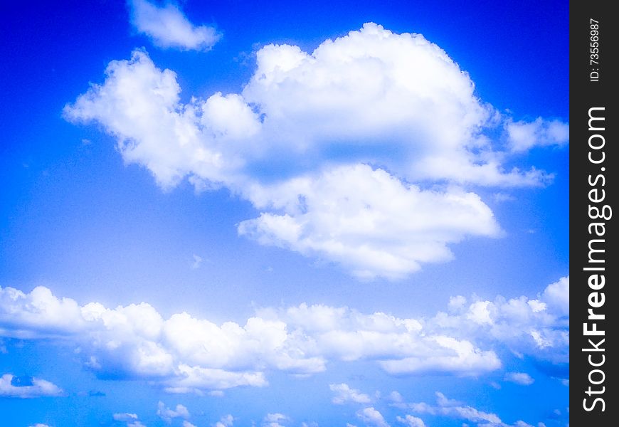 Conceptual picture with sky vision in your dream wit fluffy white clouds in a hot summer day