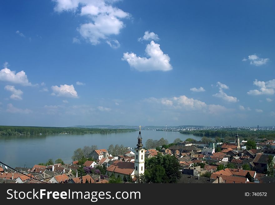 Landscape of town and river and blue sky with colds