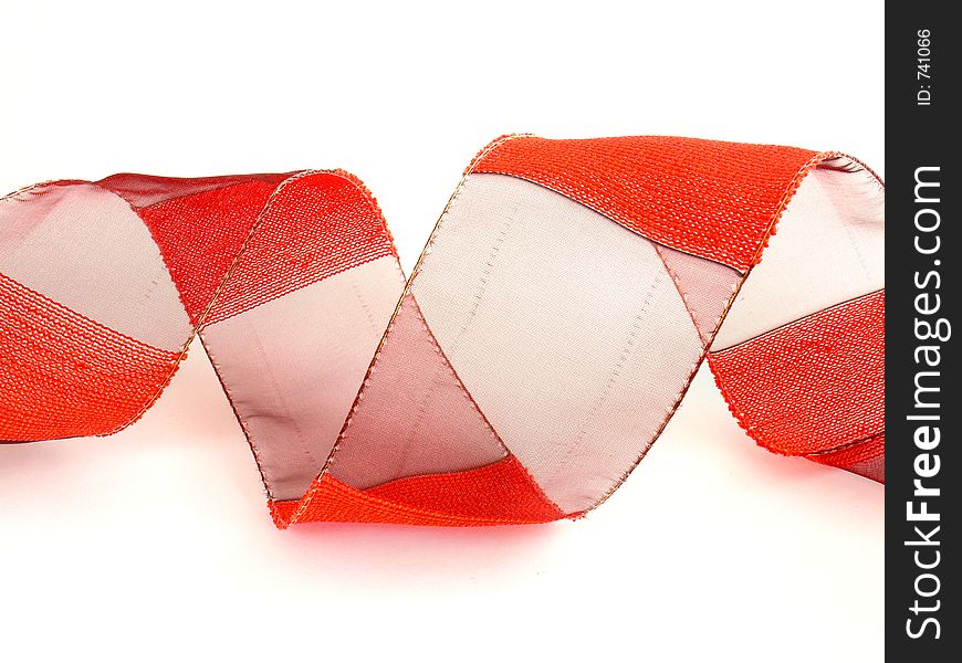Red textile ribbon on white background. Red textile ribbon on white background