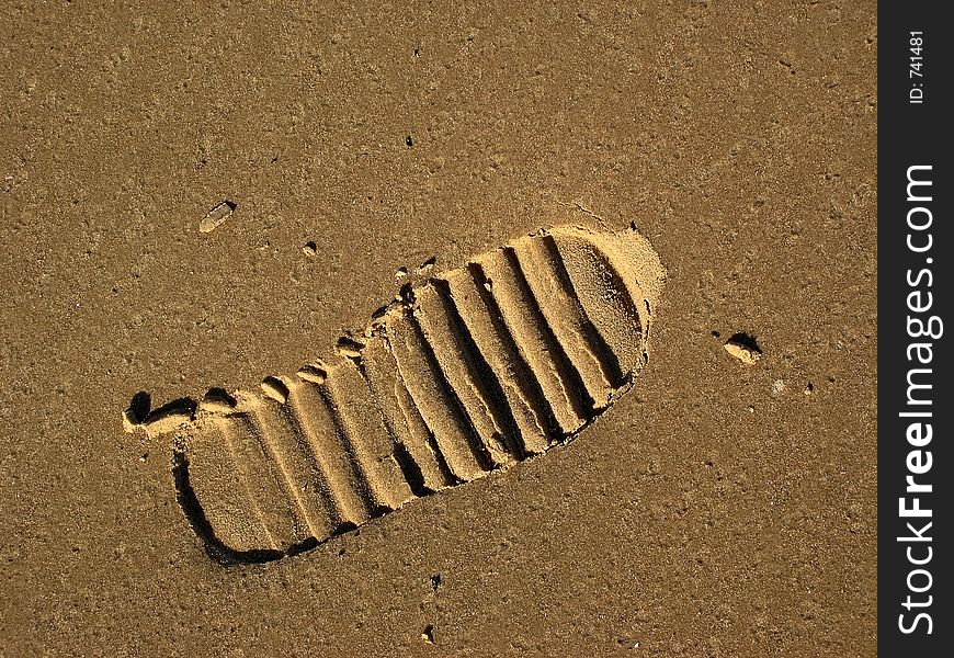 Footprint on a sandy beach. Footprint on a sandy beach.