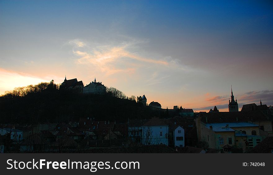 Sunset with the Gothic citadel of Sighisoara. Sunset with the Gothic citadel of Sighisoara.