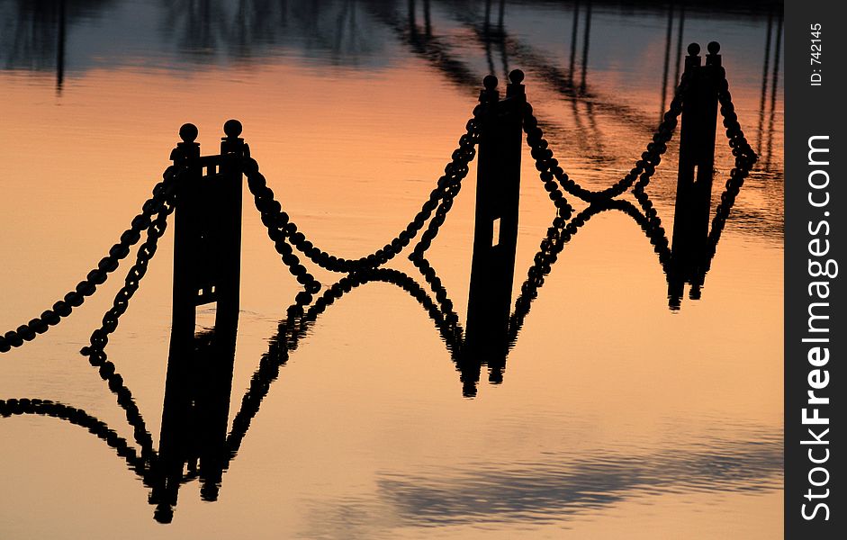 Beautiful reflections of chains during spring tide at river Moskva