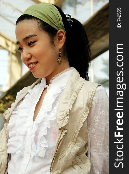 Pretty Asian woman with expression of happiness on her face. Pretty Asian woman with expression of happiness on her face