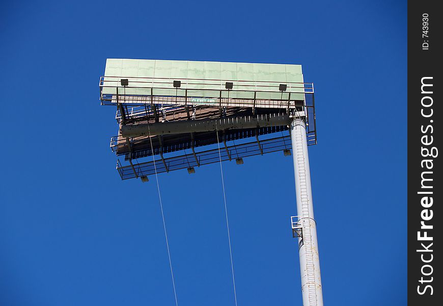 Empty billboard on a high pole. Empty billboard on a high pole