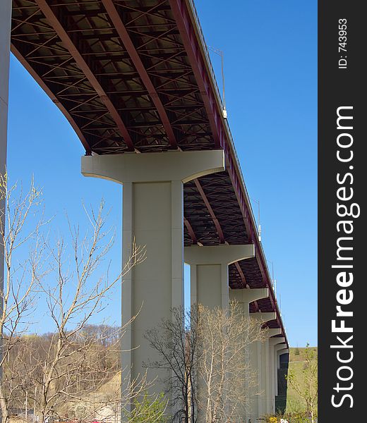 Single span of freeway bridge high overhead. Single span of freeway bridge high overhead