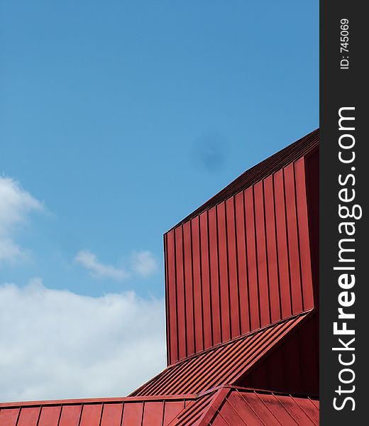 Red barn against bright blue sky. Red barn against bright blue sky