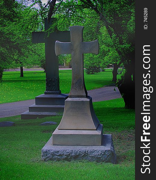 Two Large Crosses In A Cemetery, With Fog