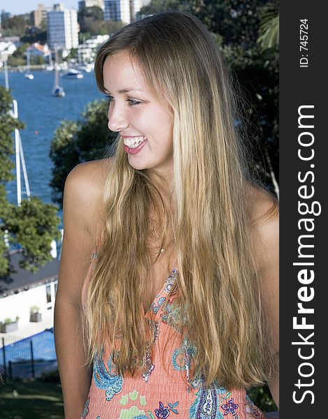 Blonde portrait on harbor, water views