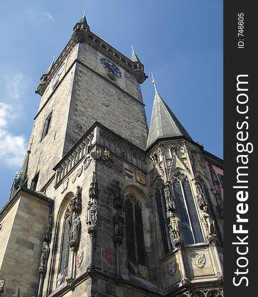 Church tower in Prague with clock face. Church tower in Prague with clock face