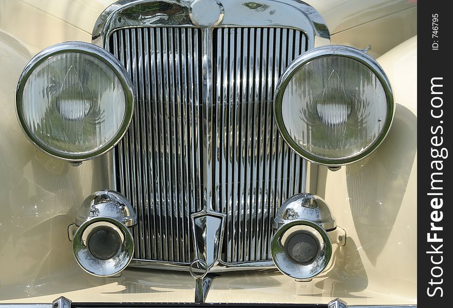 Font grill and head lights of a vintage car