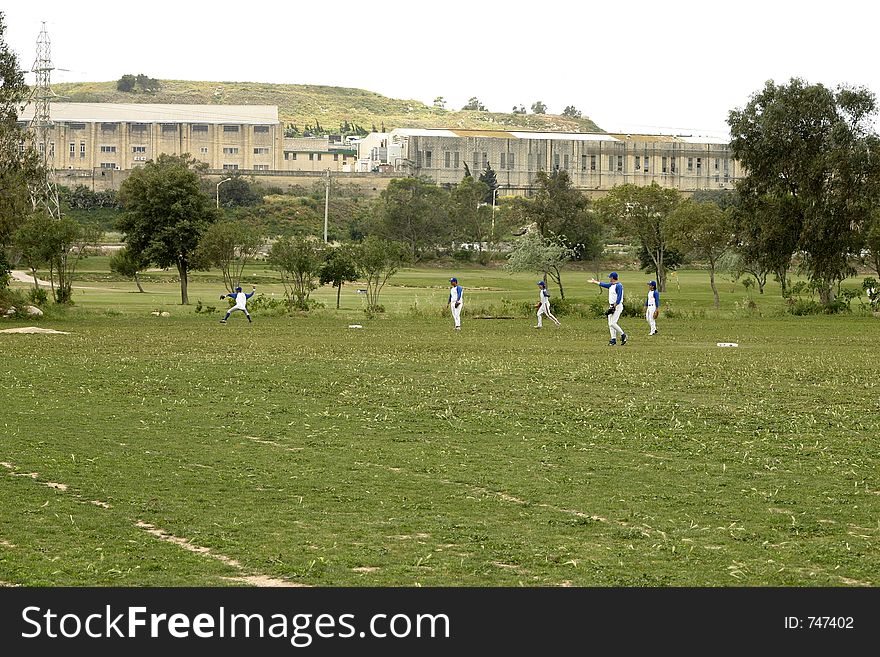 A baseball team warming up before a game. A baseball team warming up before a game