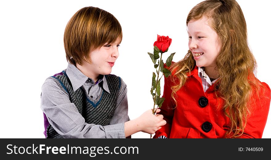 Young children couple with a red rose. Young children couple with a red rose