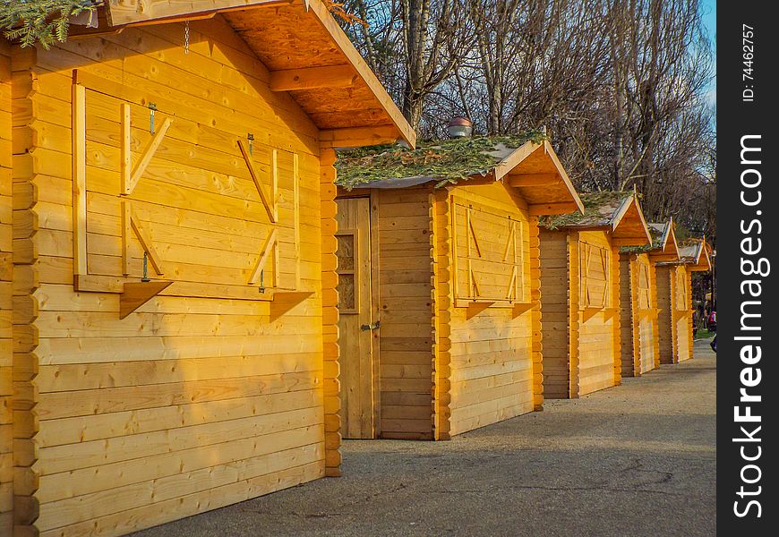 Rustic wooden market building in park