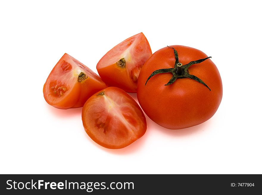 Red tomatoes isolated on white background. Studio light.