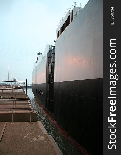 Large boat passing by in a dock. Large boat passing by in a dock