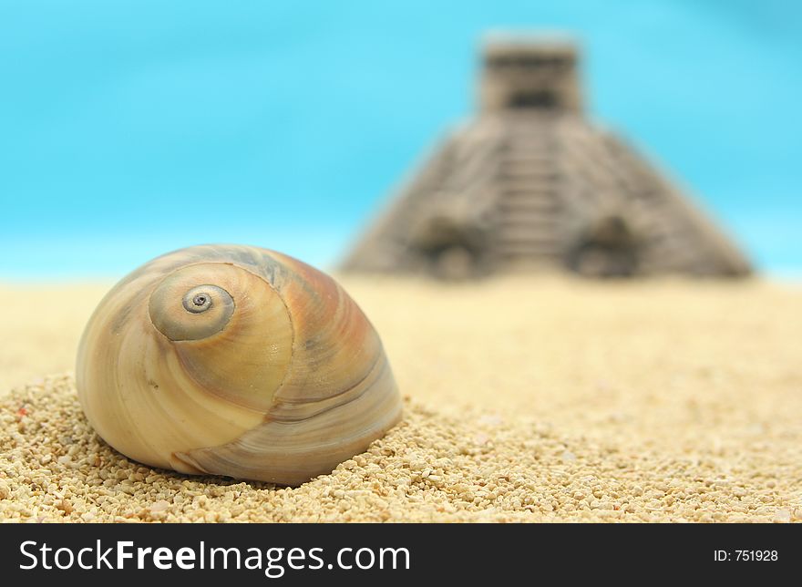 Sea Shell and Pyramid on Beach