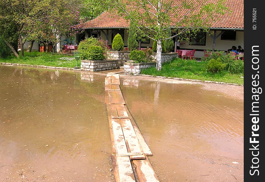 Improvised brigde over the big pool, way to the restaurant, flood. Improvised brigde over the big pool, way to the restaurant, flood