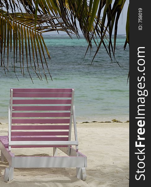 Lounge chair by the beach with copy space