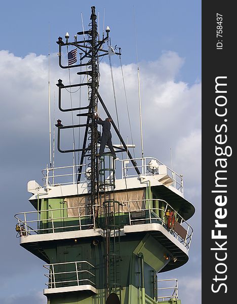 Welder on top of boat working. Welder on top of boat working