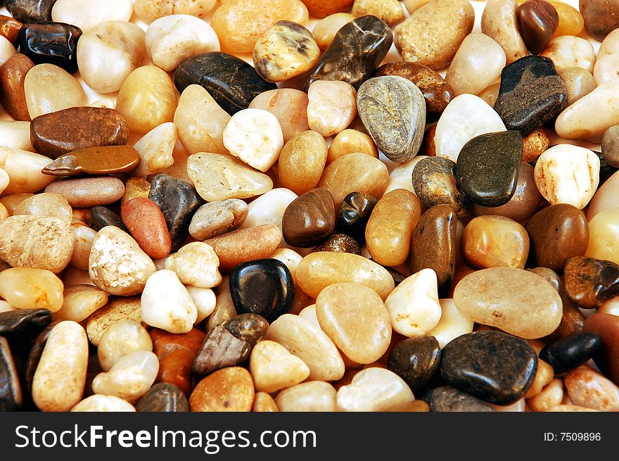 Colorful mix of round shiny pebbles and stones. Colorful mix of round shiny pebbles and stones
