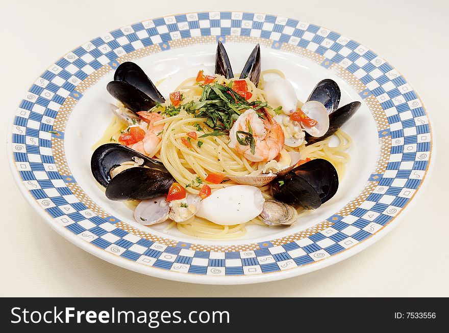 Italy seafood noodles on white dish