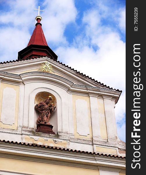 Monastery gable with religious statue in Sazava. Monastery gable with religious statue in Sazava.