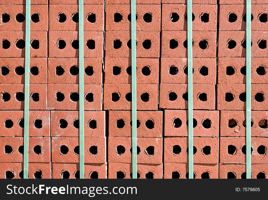 Stacks of bricks banded with green bands. Stacks of bricks banded with green bands.