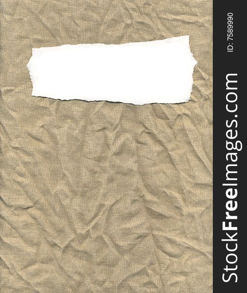 A withe label on creased burlap background for your text or title. This image is also useful for scrapbook