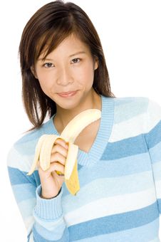 Girl With Banana Royalty Free Stock Images