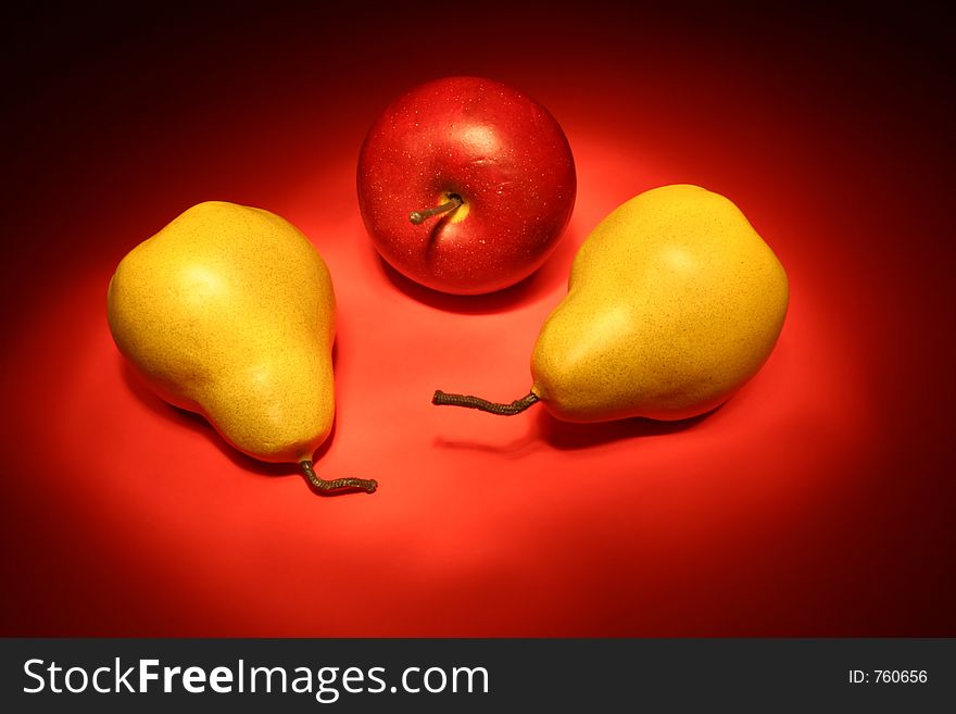 Three Pieces of Artificial Fruit are Displayed.