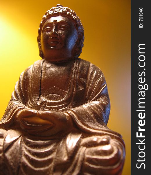 This image depicts a smiling Buddha. This image depicts a smiling Buddha.