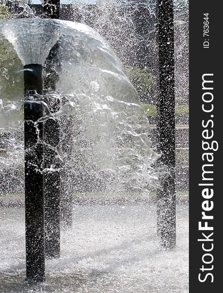 Fountain droplets frozen by fast shutter. Bad Homburg, Germany