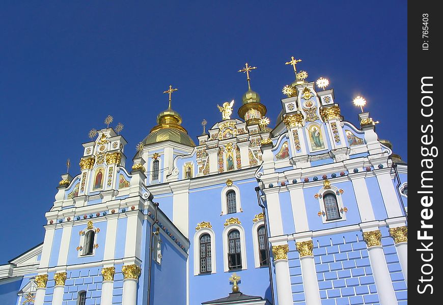 Gold domes of ortodox cathedral shine with sun. Gold domes of ortodox cathedral shine with sun