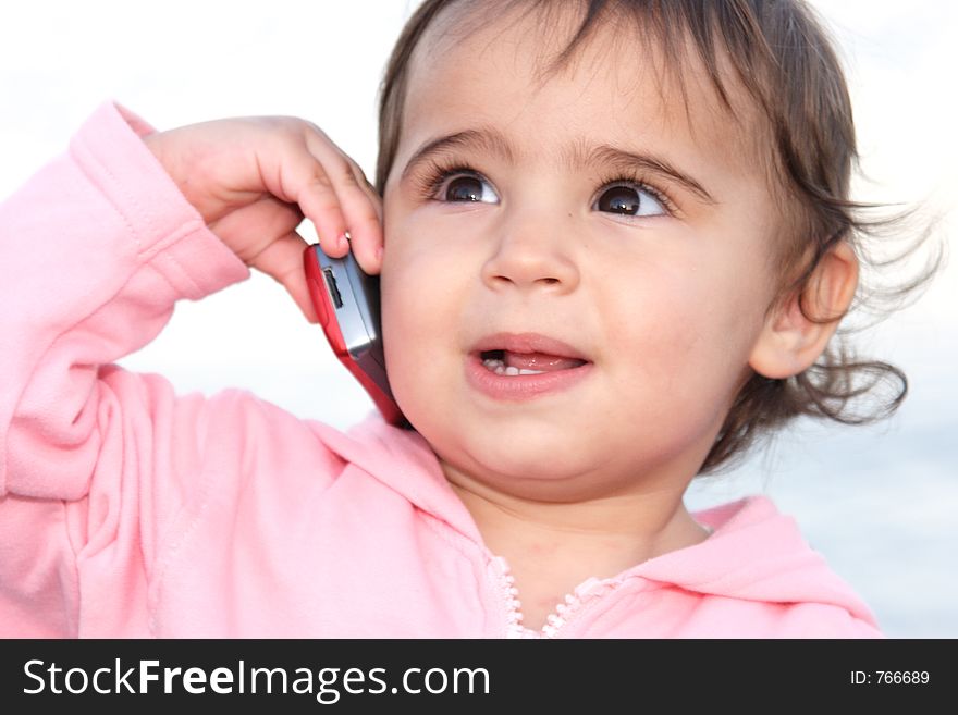 Child talking on mobile phone. Child talking on mobile phone