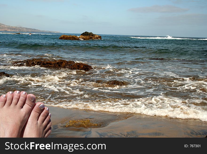 Feet and ocean. Feet and ocean