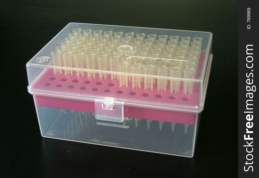 Laboratory tips in a half-transparent box. Laboratory tips in a half-transparent box