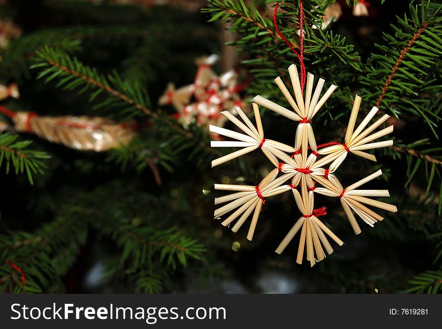 A straw star on the Christmas Tree