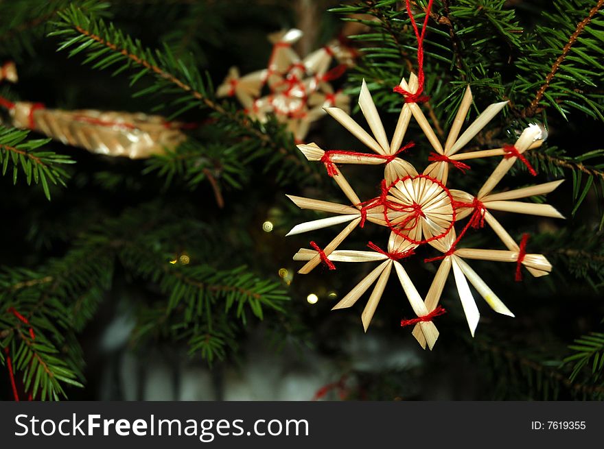 A straw star on the Christmas Tree