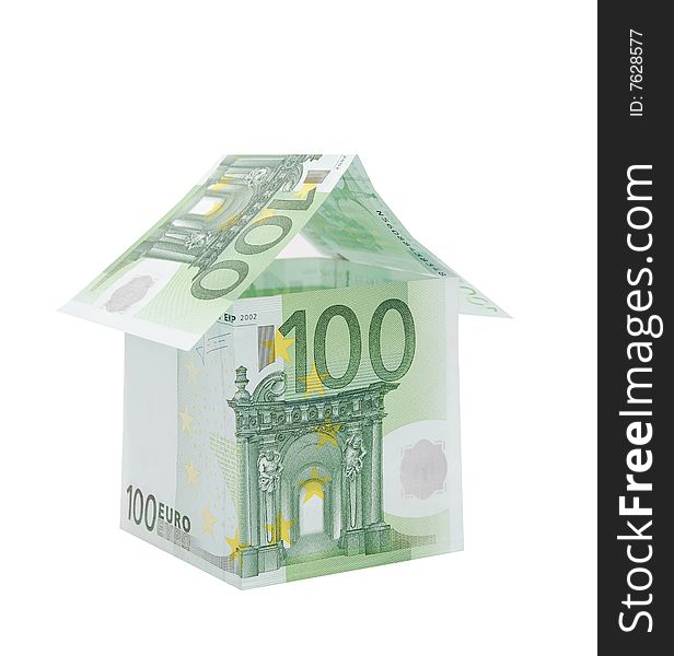 A house made from euro bills isolated on white background