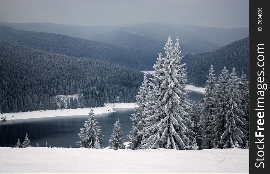 A view with a beautiful winter landscape