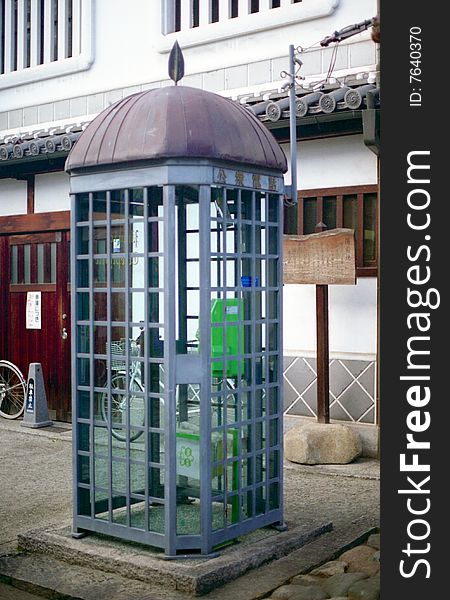 Old public phone booth in historic district of Kurashiki, Japan. Old public phone booth in historic district of Kurashiki, Japan