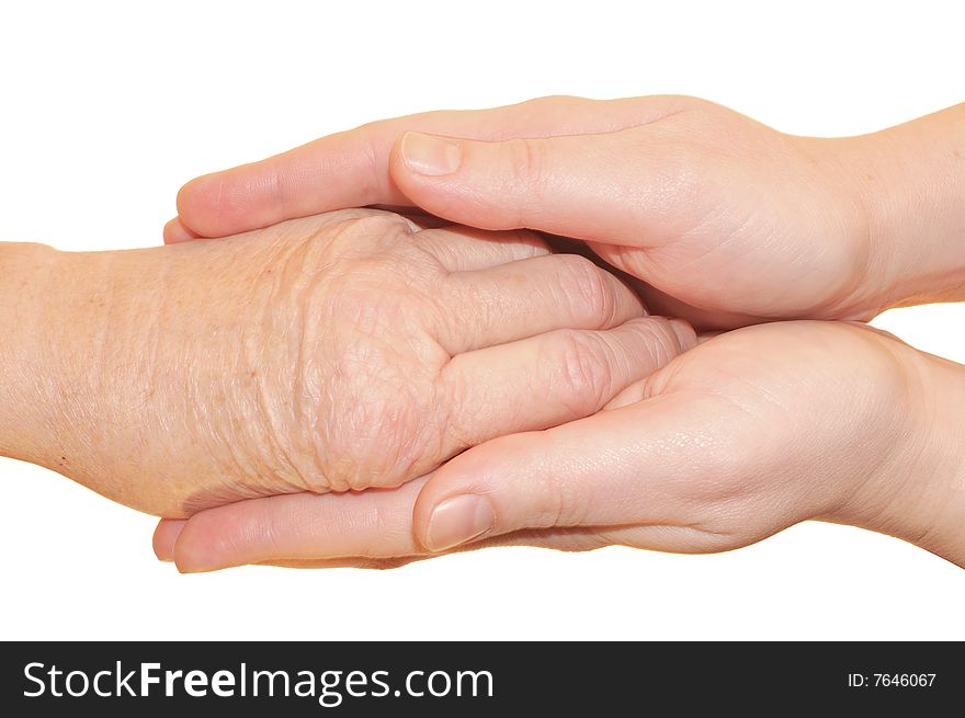 A handshake, young hands hug a granny hand