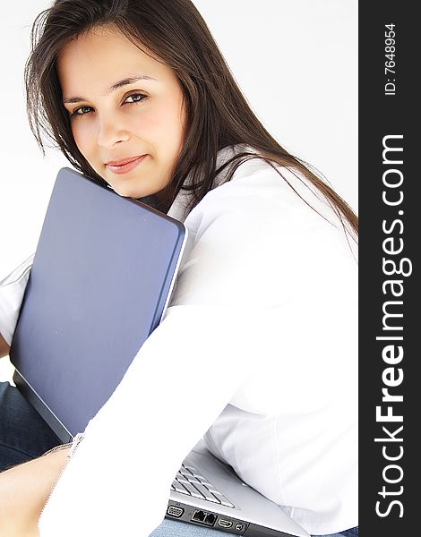 Beautiful young woman with her laptop. Beautiful young woman with her laptop