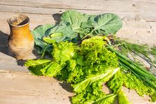 Cabbage, Onions, Cucumbers And Vintage Jug On The Wooden Table Royalty Free Stock Images