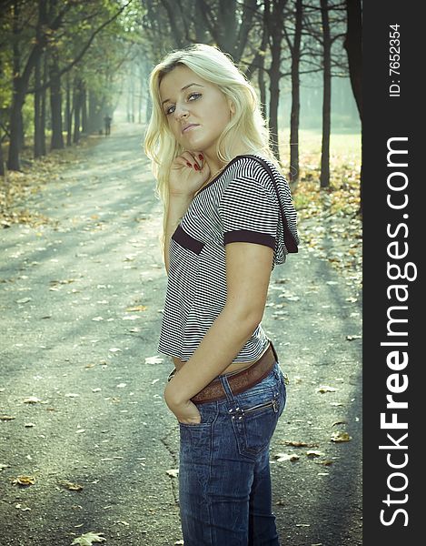 A portrait shot of a girl in park. A portrait shot of a girl in park