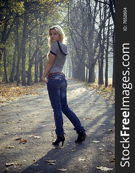 A portrait shot of a girl in park. A portrait shot of a girl in park