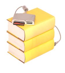 Books With A Compact Flash Card Reader Royalty Free Stock Photography