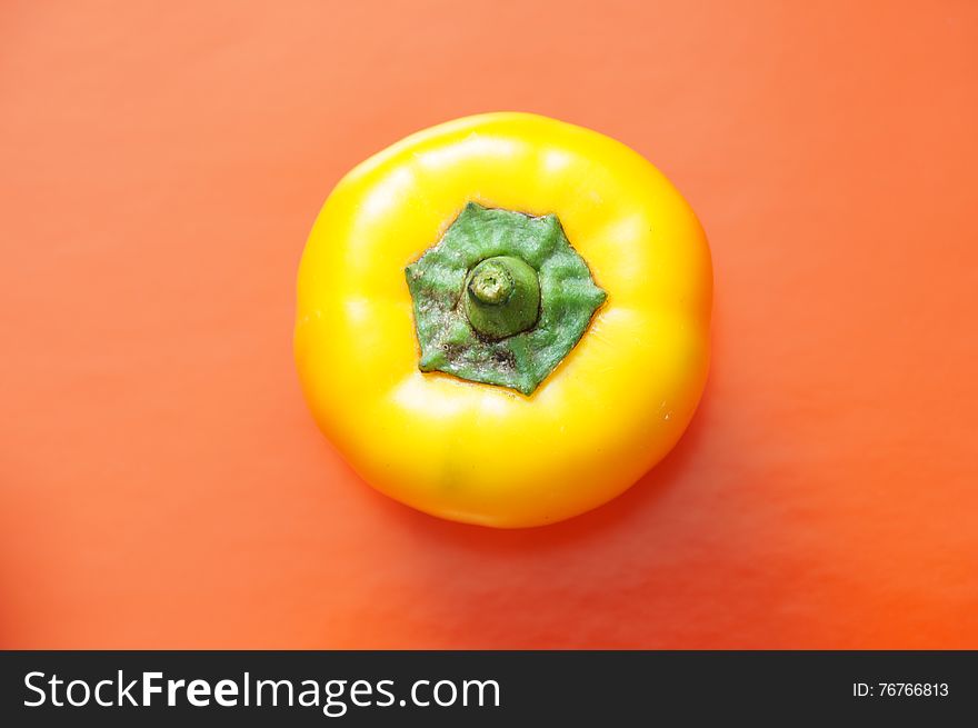 Yellow pepper isolated on a colorful background. Vegetables isolated on background.
